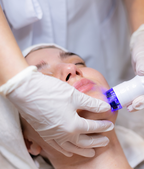 Clinician performing a nasal endoscopy examination