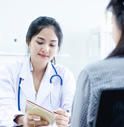 Doctor discussing women cancer with patient